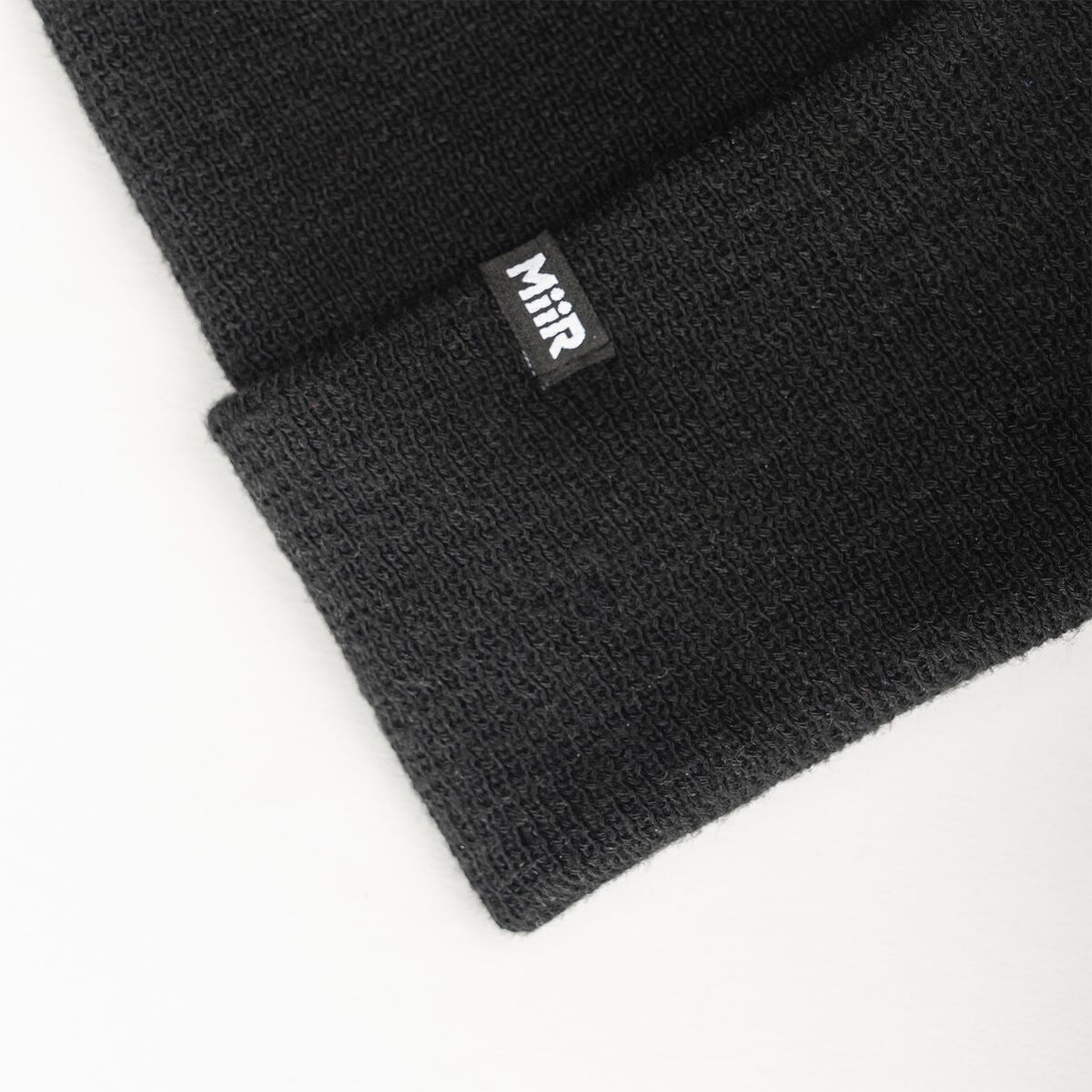 recycled-poly-fine-knit-beanie-x2 WebPDP-RecycledPolyFineKnitBeanie_Studio_TagDetail_Black__BNE005002OS.jpg
